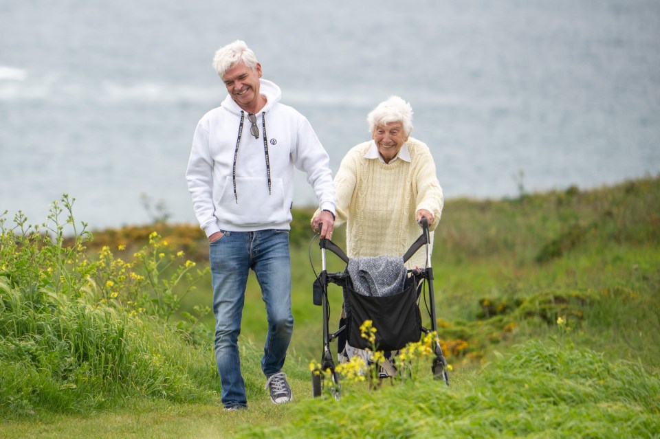 Phillip Schofield walks with mum Pat in the West Country after he quit This Morning