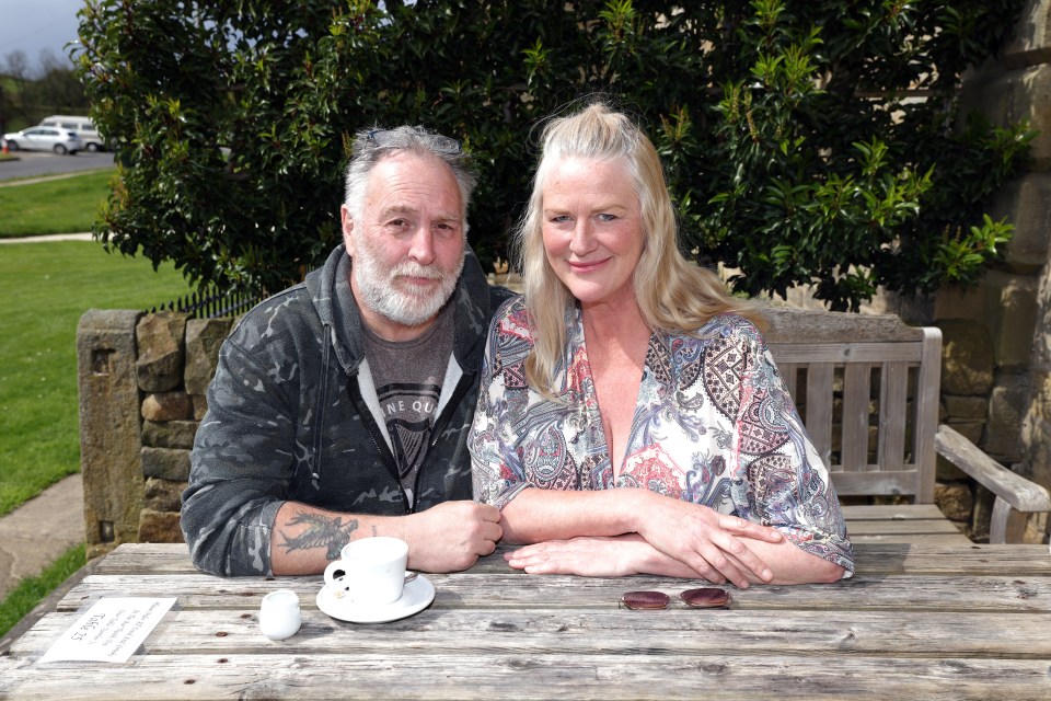 Tourists Anna Clark and John Dixon in the garden of The Crown pub