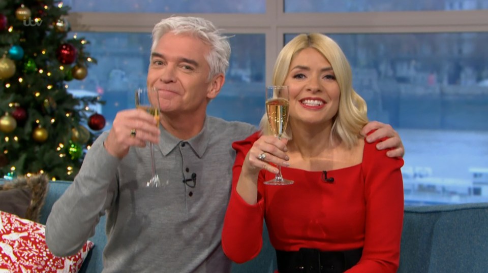 The pair raise a glass of bubbly on the last show of 2019