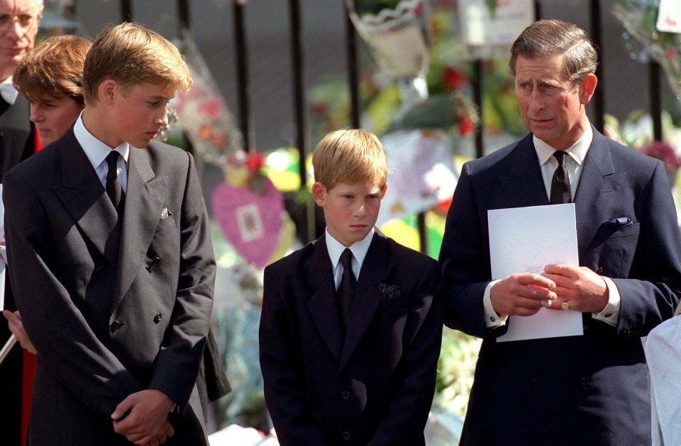 Charles with Prince William and Prince Harry outside Westminster Abbey at the funeral of Diana