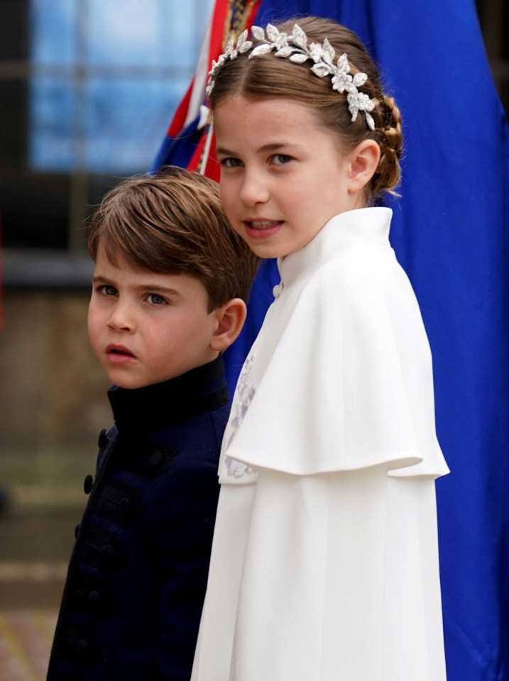 Prince Louis and his sister Princess Charlotte wait to enter Westminster Abbey before the beginning of the coronation