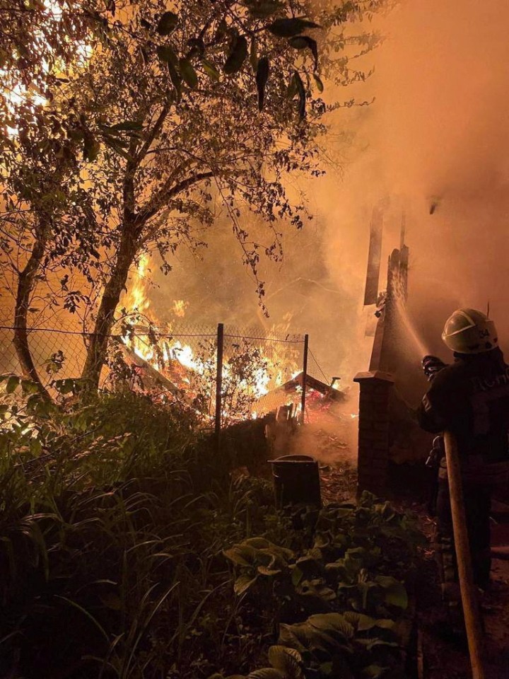 Firefighters at the site of a damaged building in Kyiv after Moscow's drone attack