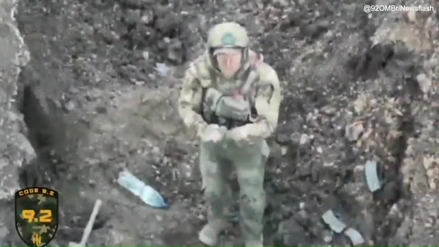 A Russian soldier has been filmed surrendering to a Ukrainian drone