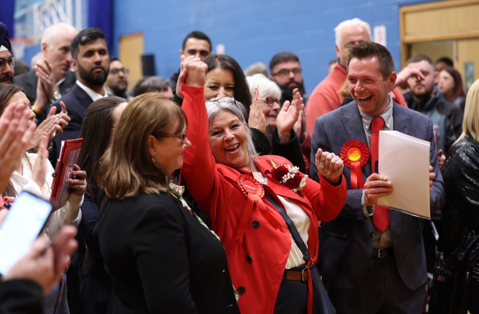 Labour celebrate winning seats during the Stoke-On-Trent election count