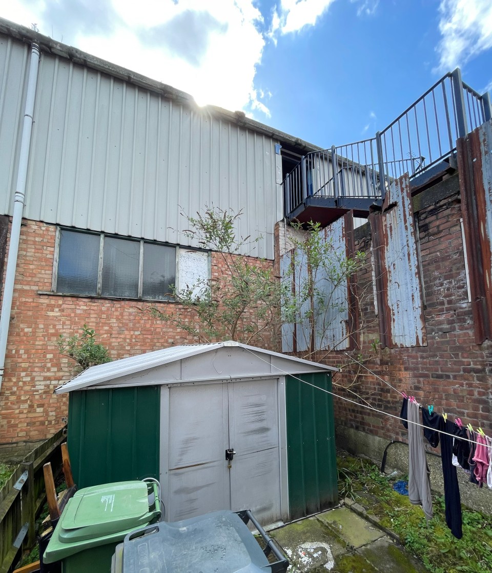 The stairs to the away end loom over residents' back gardens