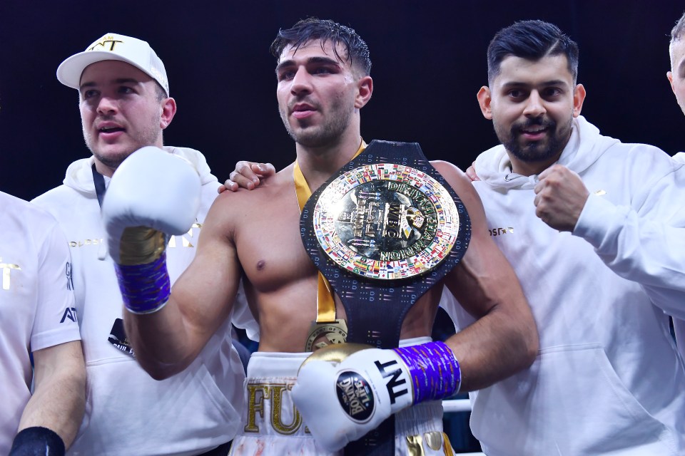 Tommy Fury celebrating defeating Jake Paul