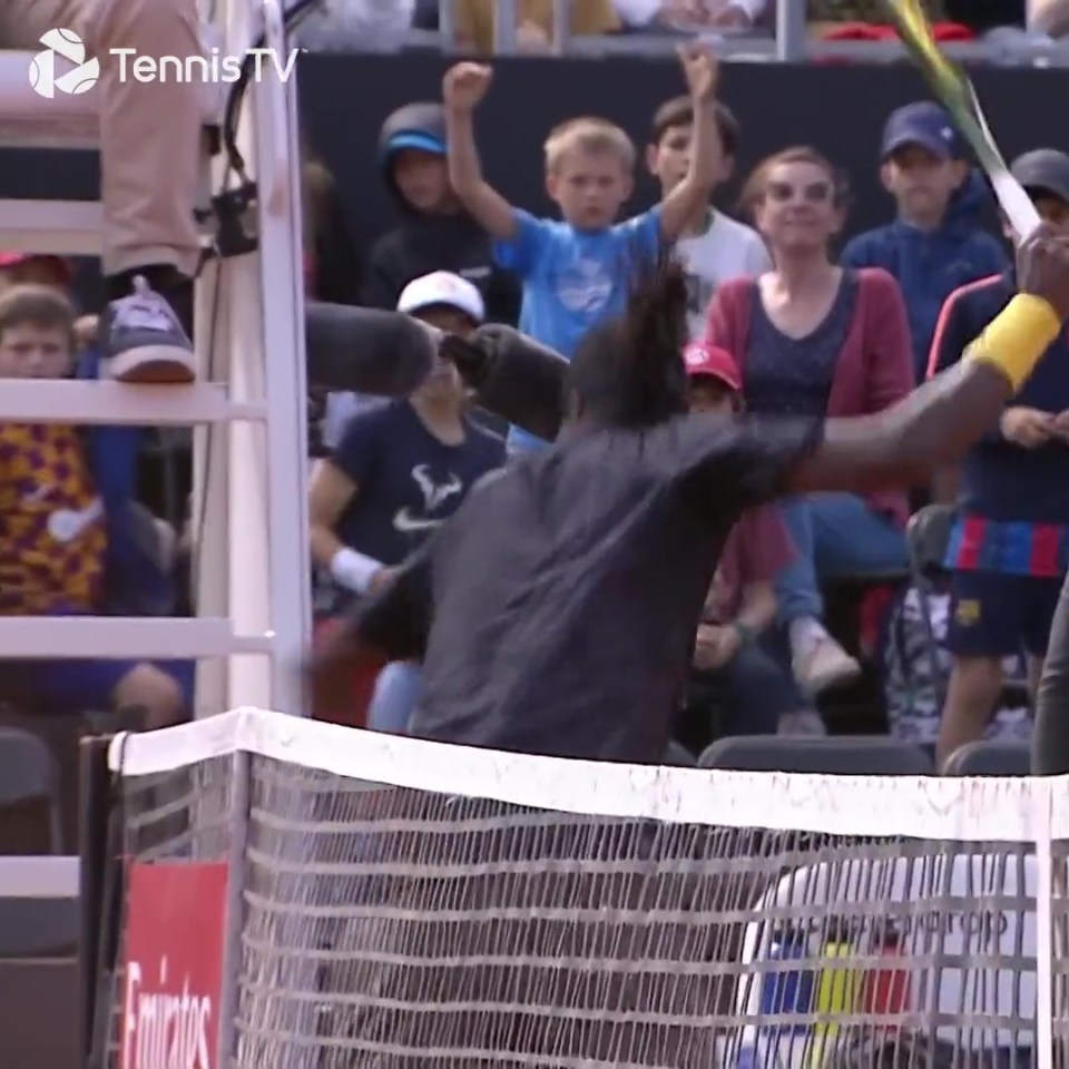 He then smashed his racket against the umpire's chair