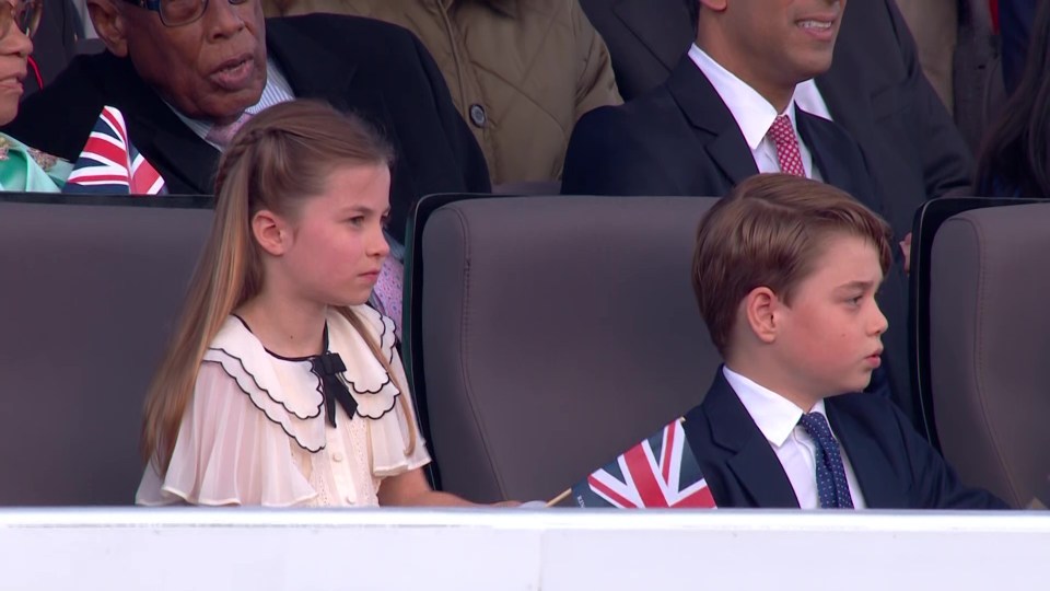 Princess Charlotte and Prince George waved the Union Jack flag before the concert kicked off