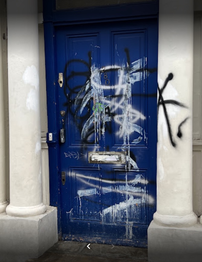 People took to Google Reviews to express their disappointment in the graffiti, saying the door had seen better days