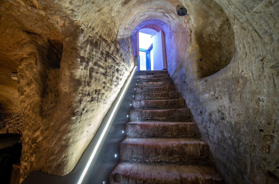 The stairs leading down to the property's unusual feature