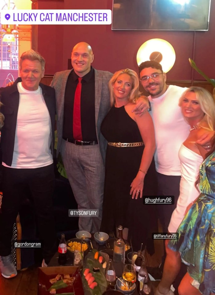 Fury and his family posed with Ramsay inside the restaurant