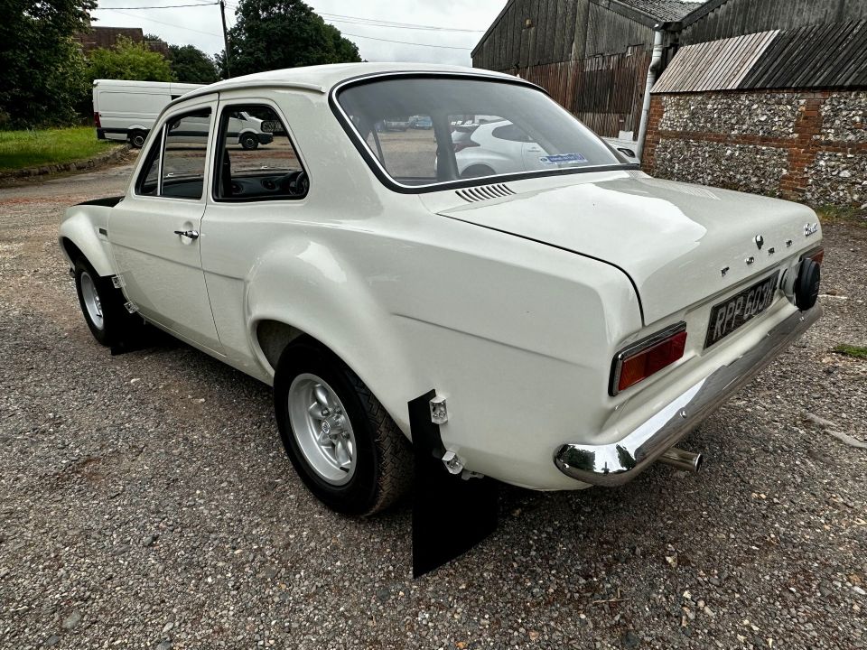 The bodywork, including black bonnet and mud flaps, is a nod to its rallying heritage