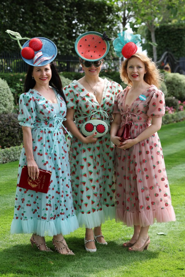 This trio opted for a fruity theme, standing out with matching cherry, watermelon and strawberry dresses