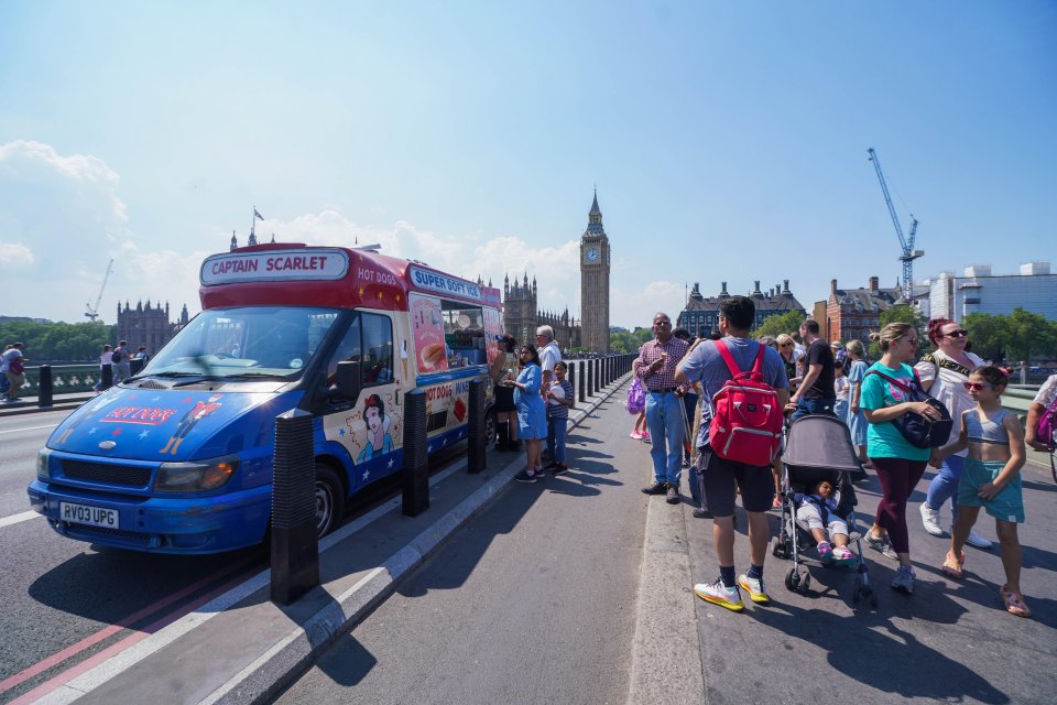 People queued for ice cream on Westminster bridge to cool down