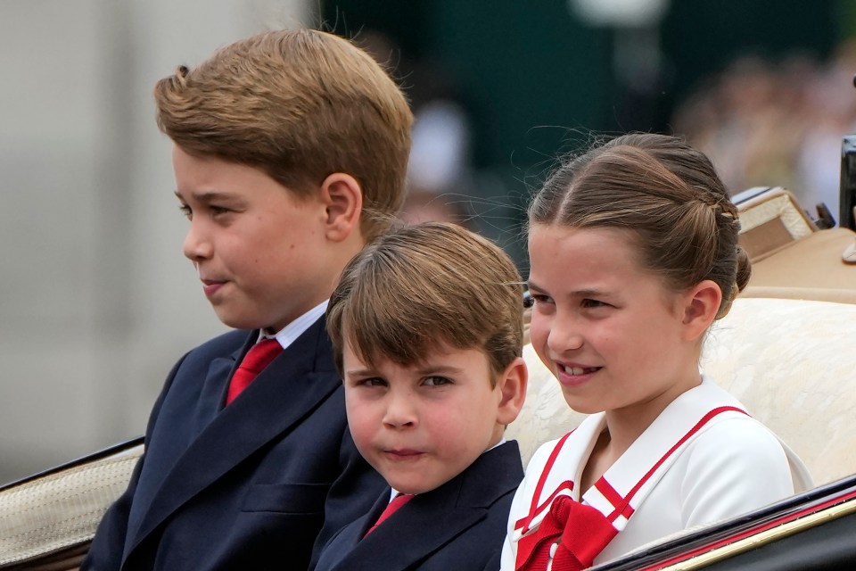 Prince George and Prince Louis looked dapper in their matching navy suits and red ties