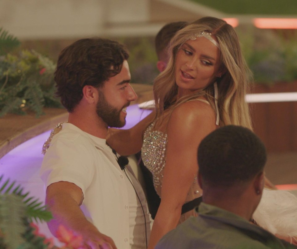 Sammy looked delighted as Leah got close to him during the task