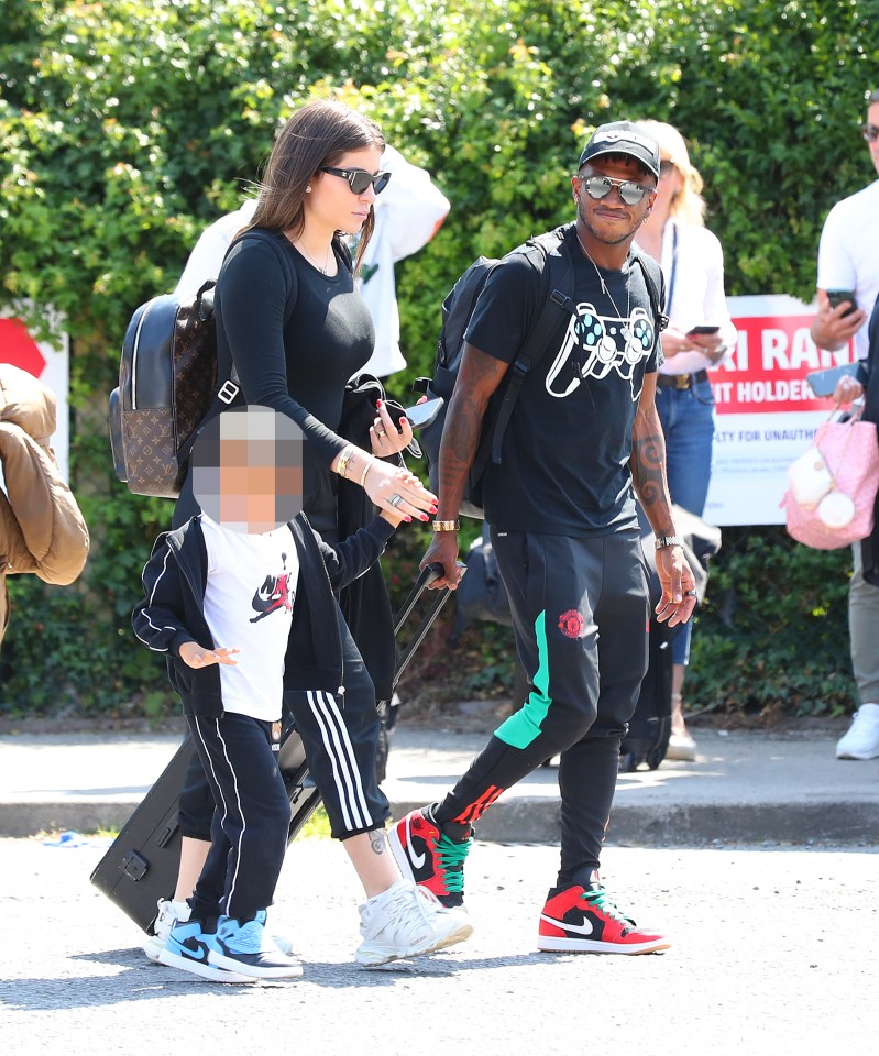 Fred walks side by side with wife Monique