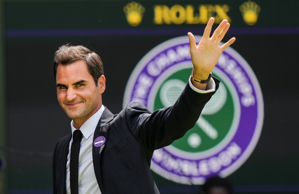 Tennis legend Roger Federer waving goodbye to Wimbledon.