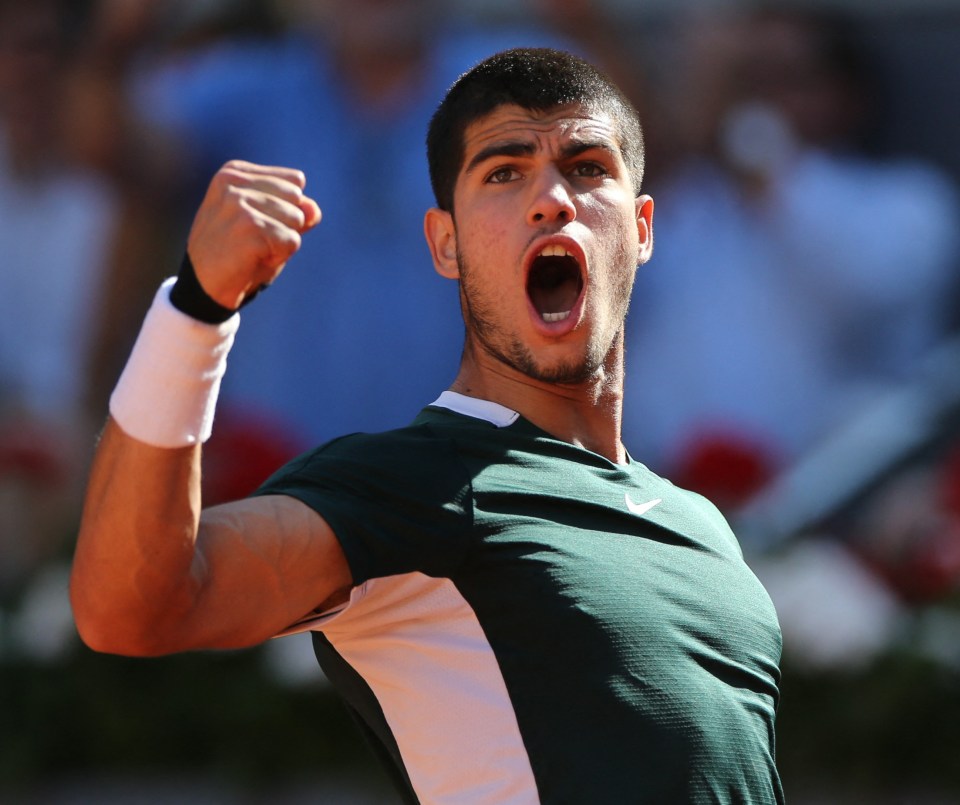 Tennis - ATP Masters 1000 - Madrid Open - Caja Magica, Madrid, Spain - May 7, 2022 Spain's Carlos Alcaraz Garfia reacts during his semi final match against Serbia's Novak Djokovic REUTERS/Isabel Infantes