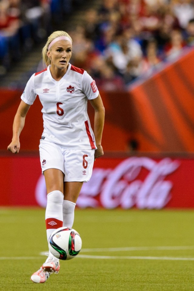 MONTREAL, QC - JUNE 15:  Kaylyn Kyle #6 of Canada moves the ball during the 2015 FIFA Women's World Cup Group A match against the Netherlands at Olympic Stadium on June 15, 2015 in Montreal, Quebec, Canada.  Final score between Canada and the Netherlands 1-1. (Photo by Minas Panagiotakis/Getty Images)