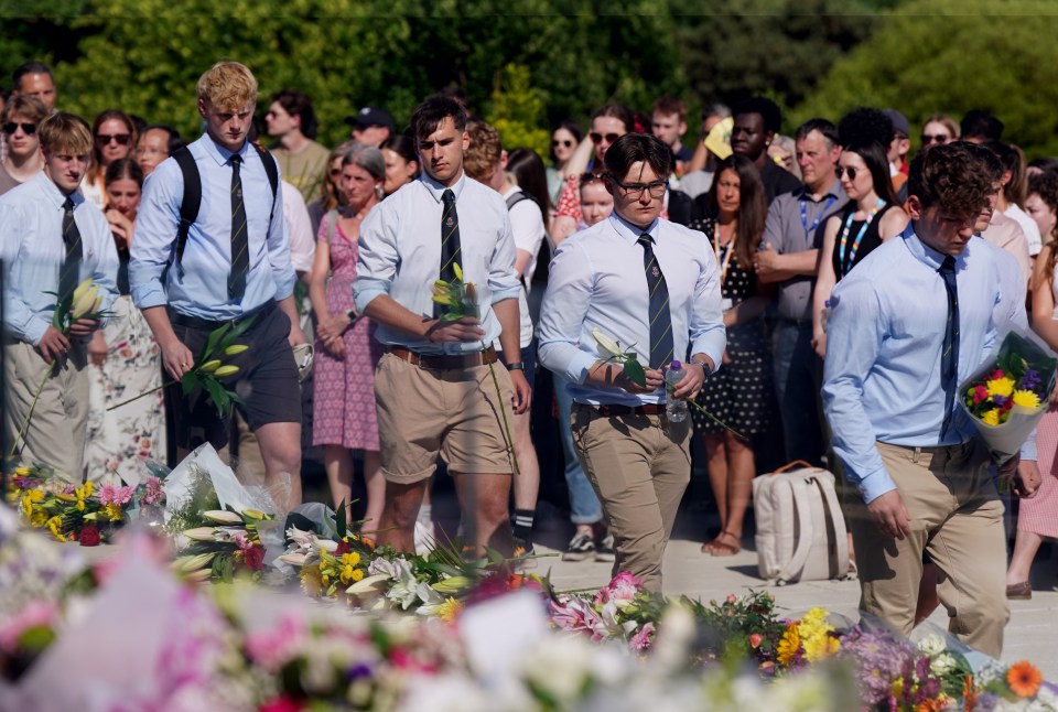 Barnaby's teammates attend the vigil at the University of Nottingham