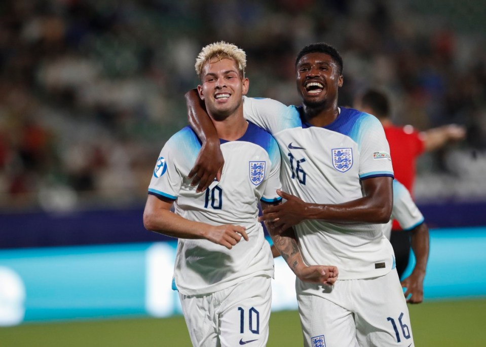 Emile Smith Rowe celebrates his goal against Israel with Ben Johnson