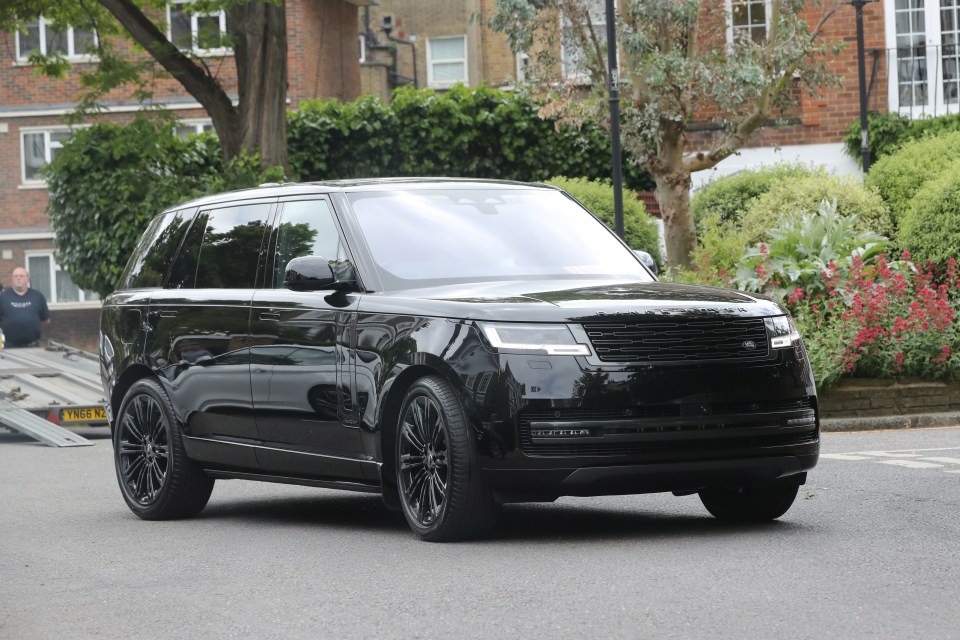 Simon was seen climbing into the car at his West London home