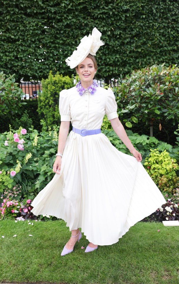 Model and TV host Rosie Tapner nailed the elegant Royal Ascot theme with her cream midi with purple accessories