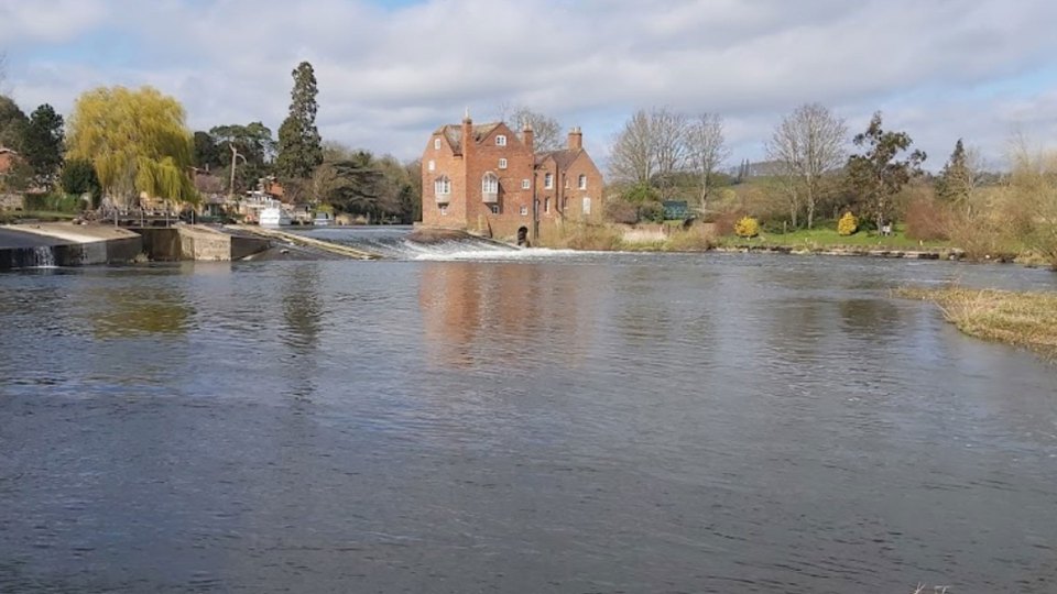 The woman, in her 70s, was found in the River Avon near Evesham, Shropshire