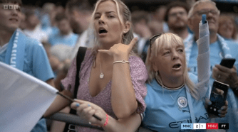 A Man City fan gestured 'call me' while celebrating