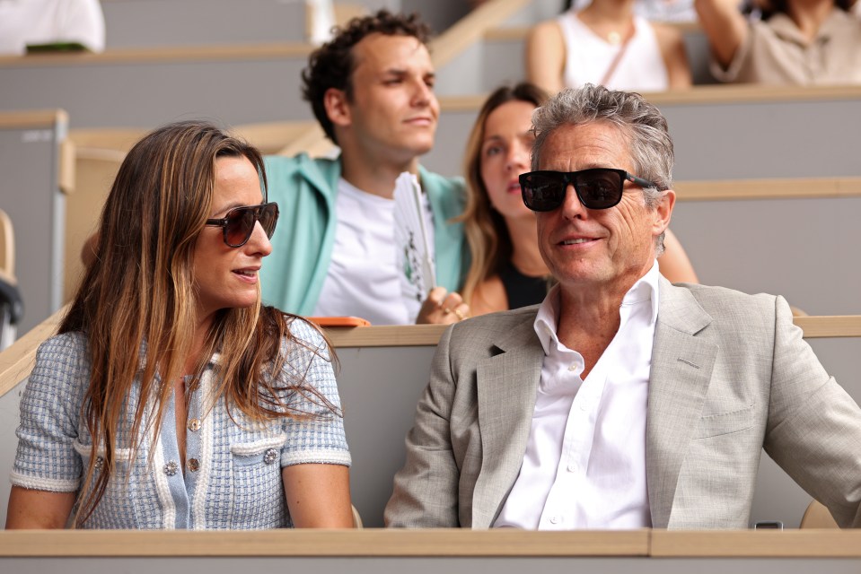 Hugh Grant and his wife Anna Eberstein hung out at Court Philippe-Chatrier