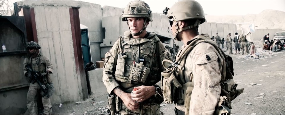 Adam, left, and a comrade on duty in Afghanistan