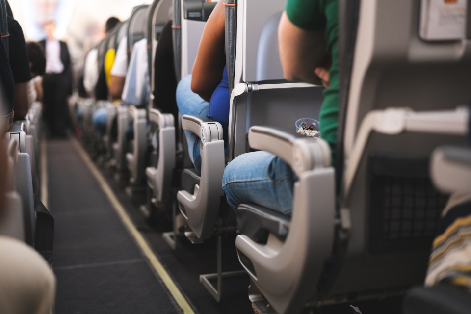 The pair recommend sitting across the aisle from each other