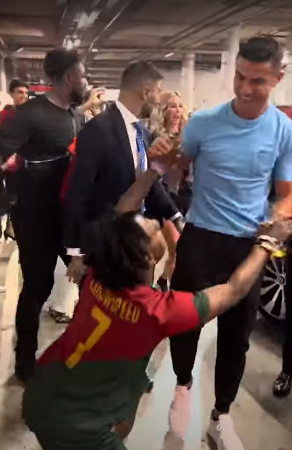 Ronaldo smiled and hugged his superfan