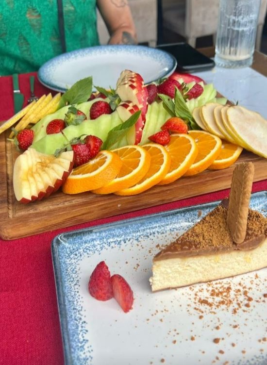 The couple enjoyed a fruit platter and cheesecake