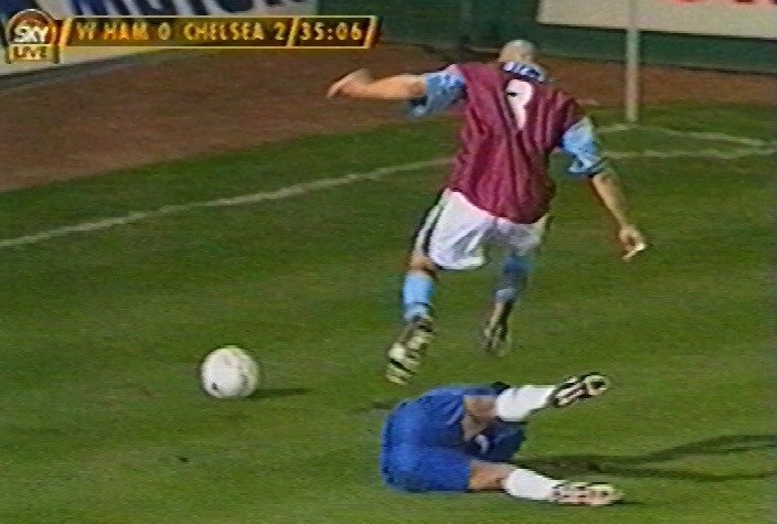 Julian was accused of stamping on the head of Chelsea player John Spencer during a match, above