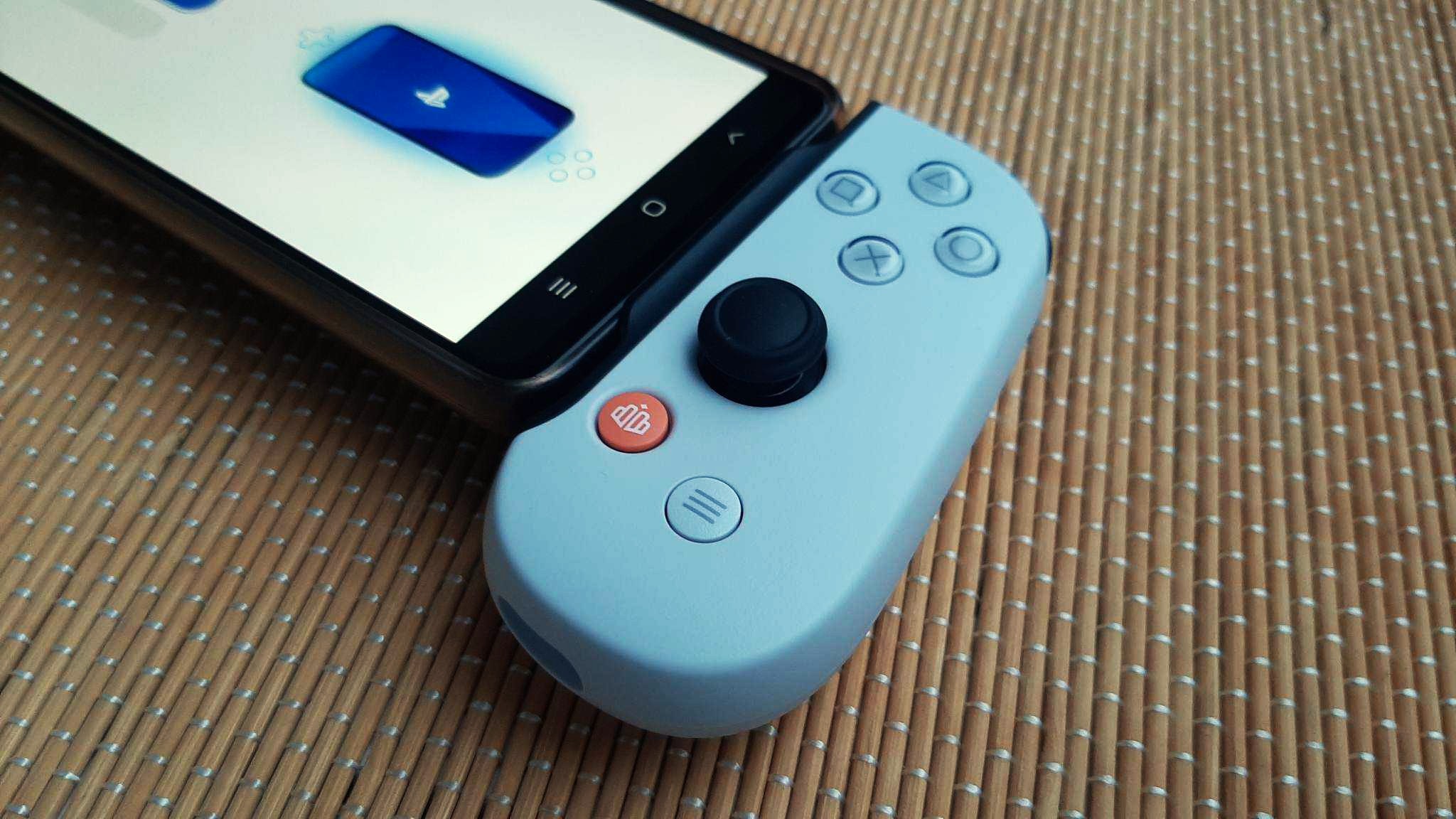 a game controller with a red button that says id