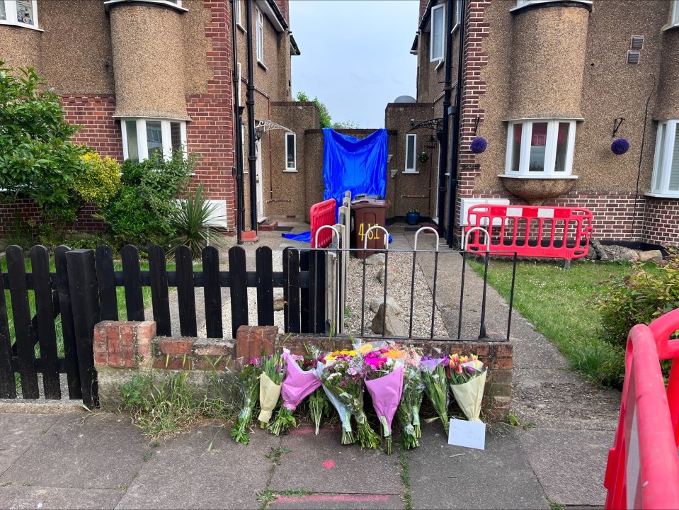 Floral tributes were laid at the family's home yesterday