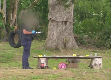 Pictures show a bottle of pop and a picnic bag on the bench