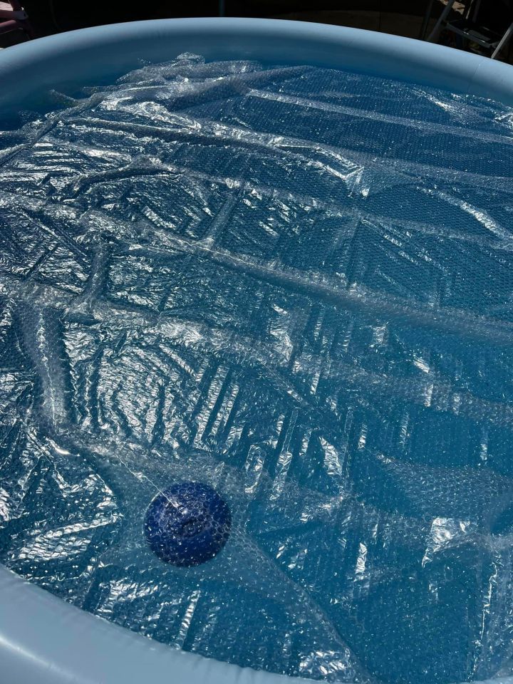 She uses bubble wrap on the surface, and it warmed her pool up by up to 14 degrees