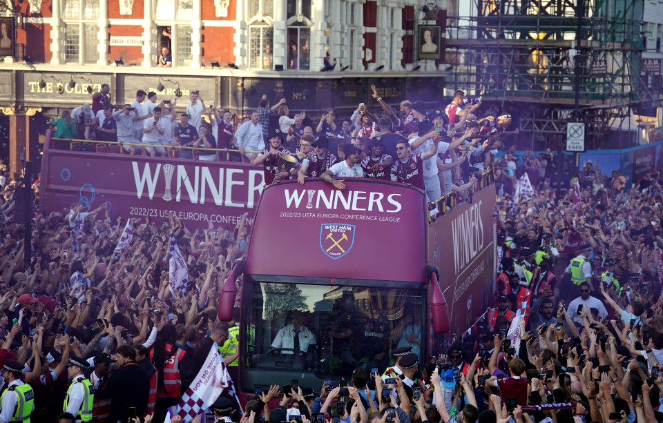 West Ham United's Declan Rice and his team mates celebrate during an open top bus parade, following Wednesday's 2-1 victory over Fiorentina in the Europa Conference League final and ended their 43-year wait for a trophy. Picture date: Thursday June 8, 2023. PA Photo. See PA story SOCCER West Ham Parade. Photo credit should read: Lucy North/PA Wire. RESTRICTIONS: Use subject to restrictions. Editorial use only, no commercial use without prior consent from rights holder.