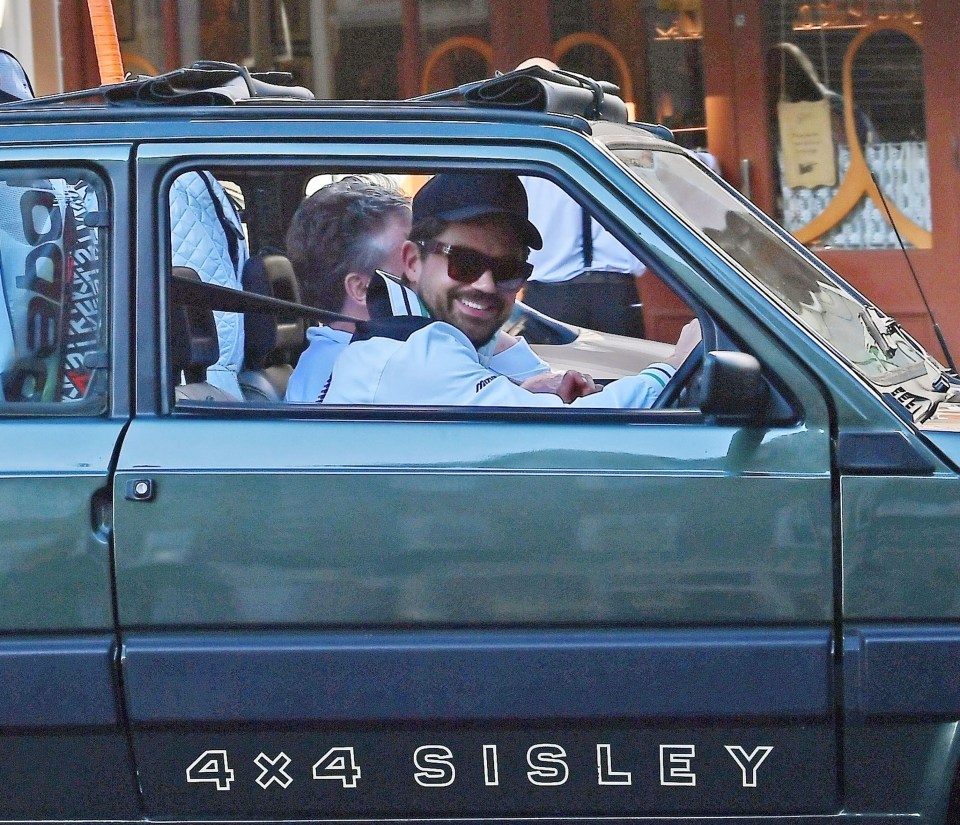 The actor and his pal were spotted laughing in the front seats, with the trees planted on the back seats of the limited-edition motor