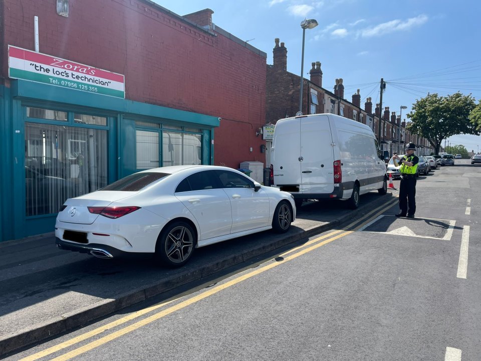 Two more vehicles badly parked on the pavement