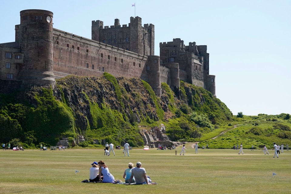 Cricket matches below the castle have helped Bamburgh's quaint image - though residents fear the place could now be attracting too many newcomers