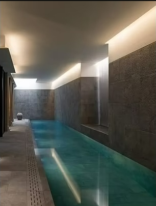 It also has a cellar and bar, as well as a gigantic swimming pool