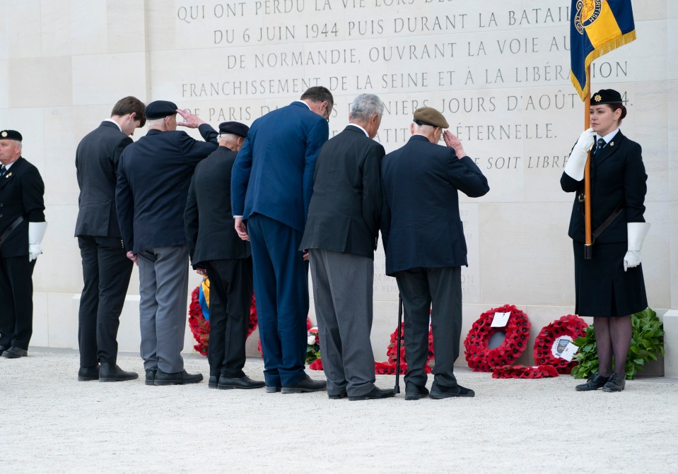 Veterans of D-Day pay tribute to fallen comrades at the Normandy Memorial