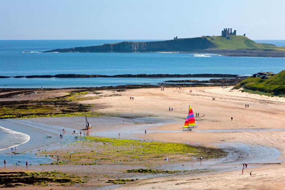 Dunstanburgh castle sits at the other side of Embleton bay near the pub