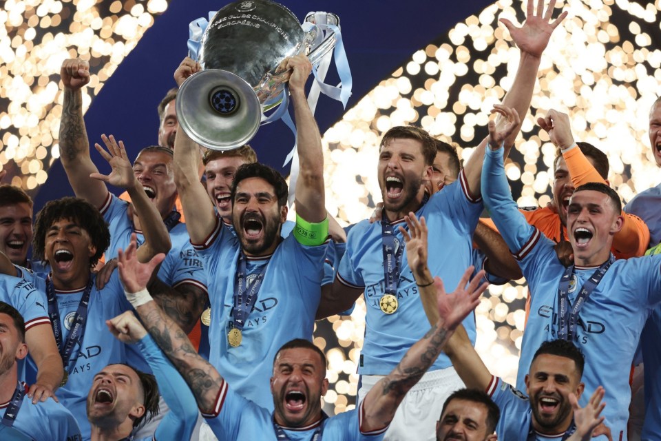 Ilkay Gundogan lifts the Champions League trophy