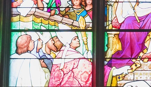 A bishop depicted in a historic church window is the spit of Paul Gascoigne