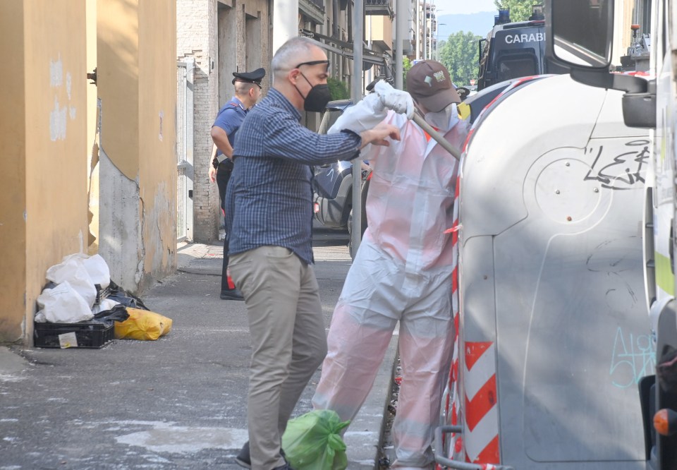 Cops have been pictured searching through bins near the hotel